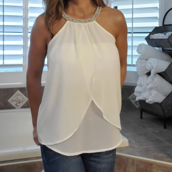 cream flowy top
